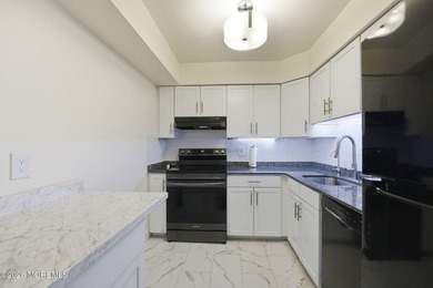 Beautifully maintained 2-bedroom townhouse-style condo with a on Raintree Golf Course in New Jersey - for sale on GolfHomes.com, golf home, golf lot