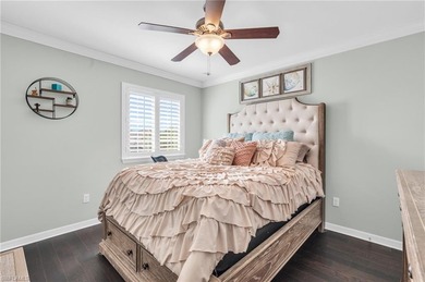 Thoughtfully positioned to capture sunsets over the lake, this on Valencia Golf and Country Club in Florida - for sale on GolfHomes.com, golf home, golf lot