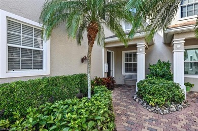 This Beautiful coach home is situated in the Wellington Place II on  in Florida - for sale on GolfHomes.com, golf home, golf lot