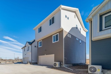 The Rand features a spacious, open layout with 2-car garage, 4 on Buffalo Run Golf Course in Colorado - for sale on GolfHomes.com, golf home, golf lot