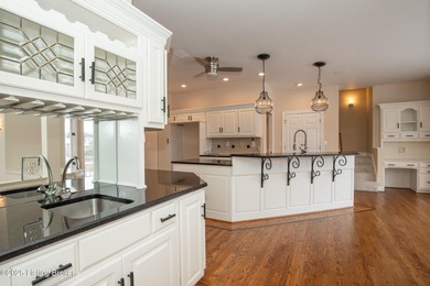 Nestled on a peaceful cul-de-sac with an amazing vista over the on Lake Forest Country Club in Kentucky - for sale on GolfHomes.com, golf home, golf lot