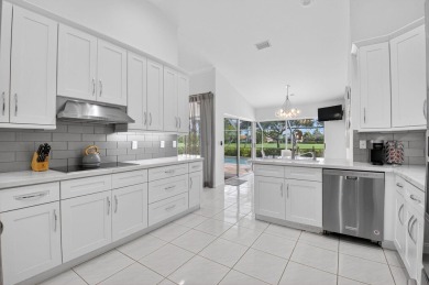 Welcome to 10791 River Glenn Dr, a stunning single-family home on Boca Woods Country Club in Florida - for sale on GolfHomes.com, golf home, golf lot