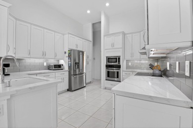 Welcome to 10791 River Glenn Dr, a stunning single-family home on Boca Woods Country Club in Florida - for sale on GolfHomes.com, golf home, golf lot