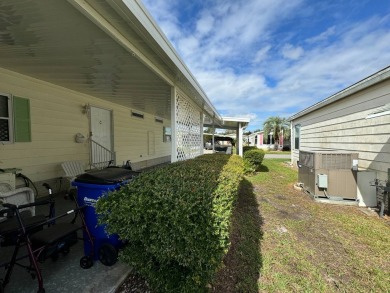 Location, Location, Location! This generously sized home is on Lake Henry Golf Club in Florida - for sale on GolfHomes.com, golf home, golf lot