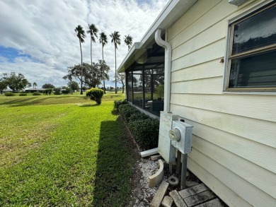 Location, Location, Location! This generously sized home is on Lake Henry Golf Club in Florida - for sale on GolfHomes.com, golf home, golf lot