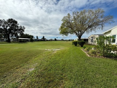 Location, Location, Location! This generously sized home is on Lake Henry Golf Club in Florida - for sale on GolfHomes.com, golf home, golf lot