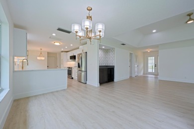 This home in Monarch Country Club is located on the 15th fairway on Monarch Country Club in Florida - for sale on GolfHomes.com, golf home, golf lot