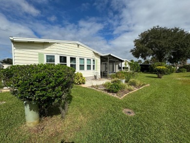 Location, Location, Location! This generously sized home is on Lake Henry Golf Club in Florida - for sale on GolfHomes.com, golf home, golf lot