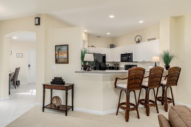 Villa for sale, first floor furnished villa with 2 bedrooms, den on Santa Lucia River Club in Florida - for sale on GolfHomes.com, golf home, golf lot