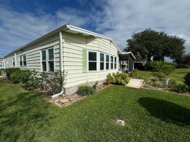 Location, Location, Location! This generously sized home is on Lake Henry Golf Club in Florida - for sale on GolfHomes.com, golf home, golf lot