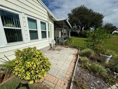 Location, Location, Location! This generously sized home is on Lake Henry Golf Club in Florida - for sale on GolfHomes.com, golf home, golf lot