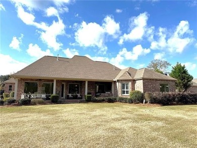 Stunning home with expansive windows overlooking the #3 fairway on Money Hill Golf and Country Club in Louisiana - for sale on GolfHomes.com, golf home, golf lot