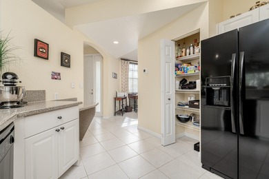 Villa for sale, first floor furnished villa with 2 bedrooms, den on Santa Lucia River Club in Florida - for sale on GolfHomes.com, golf home, golf lot