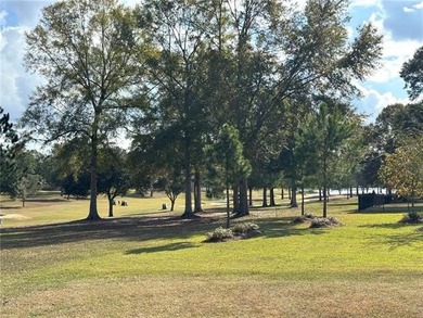 Stunning home with expansive windows overlooking the #3 fairway on Money Hill Golf and Country Club in Louisiana - for sale on GolfHomes.com, golf home, golf lot