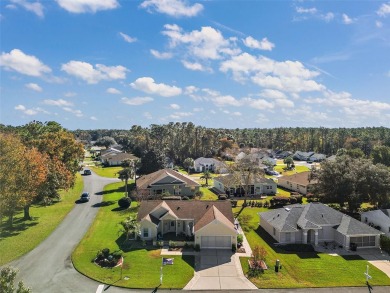 LOOK--->>$10K PRICE IMPROVEMENT ON THIS STUNNING CUSTOM HOME on Royal Oaks Golf Club in Florida - for sale on GolfHomes.com, golf home, golf lot