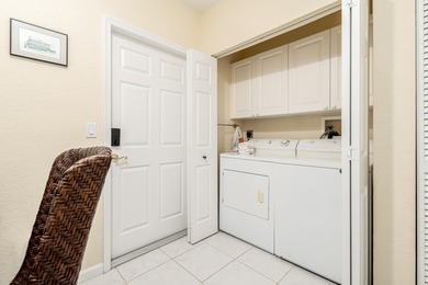 Villa for sale, first floor furnished villa with 2 bedrooms, den on Santa Lucia River Club in Florida - for sale on GolfHomes.com, golf home, golf lot