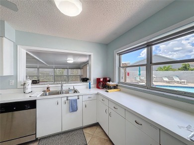 You will love this 2 bed, 2 bath, 2 car garage freestanding on Capri Isle Golf Club in Florida - for sale on GolfHomes.com, golf home, golf lot