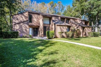 Nestled in the Spanish moss draped live oaks, this lovely 2 on Palm Harbor Golf Club in Florida - for sale on GolfHomes.com, golf home, golf lot