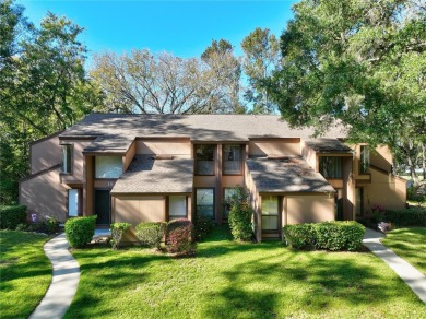 Nestled in the Spanish moss draped live oaks, this lovely 2 on Palm Harbor Golf Club in Florida - for sale on GolfHomes.com, golf home, golf lot