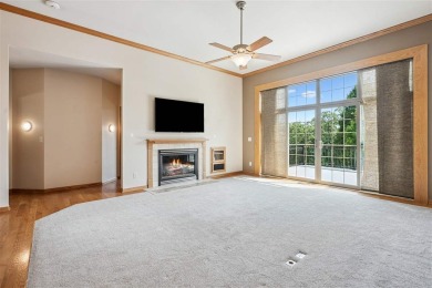 Welcome to a home where elegance meets everyday comfort on Brown Deer Golf Club in Iowa - for sale on GolfHomes.com, golf home, golf lot