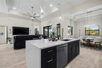 Welcome to your dream oasis! This stunning 3-bedroom, plus den on Palmetto-Pine Country Club in Florida - for sale on GolfHomes.com, golf home, golf lot