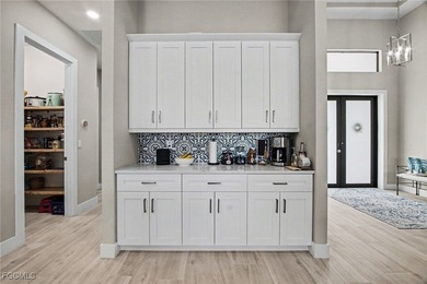 Welcome to your dream oasis! This stunning 3-bedroom, plus den on Palmetto-Pine Country Club in Florida - for sale on GolfHomes.com, golf home, golf lot