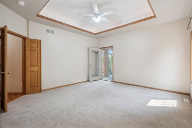 Welcome to a home where elegance meets everyday comfort on Brown Deer Golf Club in Iowa - for sale on GolfHomes.com, golf home, golf lot