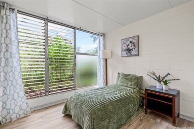 Are you looking for a cozy 2-bedroom/1-bathroom/1-parking condo on Mililani Golf Club in Hawaii - for sale on GolfHomes.com, golf home, golf lot