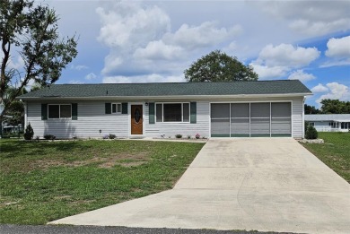 This two-bedroom, two-bathroom home with a two-car garage is on Royal Oaks Golf Club in Florida - for sale on GolfHomes.com, golf home, golf lot