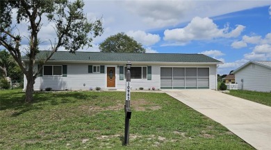 This two-bedroom, two-bathroom home with a two-car garage is on Royal Oaks Golf Club in Florida - for sale on GolfHomes.com, golf home, golf lot