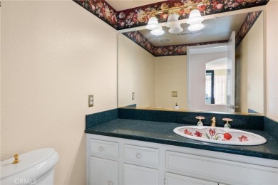 Located in the highly desirable Sun Lakes Country Club in on Sun Lakes Country Club in California - for sale on GolfHomes.com, golf home, golf lot