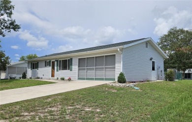 This two-bedroom, two-bathroom home with a two-car garage is on Royal Oaks Golf Club in Florida - for sale on GolfHomes.com, golf home, golf lot