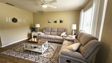 This two-bedroom, two-bathroom home with a two-car garage is on Royal Oaks Golf Club in Florida - for sale on GolfHomes.com, golf home, golf lot