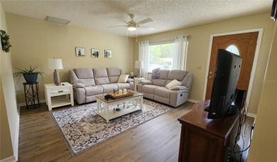 This two-bedroom, two-bathroom home with a two-car garage is on Royal Oaks Golf Club in Florida - for sale on GolfHomes.com, golf home, golf lot