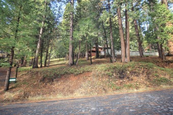 Nice tree-studded moderate upslope lot in great Blue Lake on Sequoia Woods Country Club in California - for sale on GolfHomes.com, golf home, golf lot