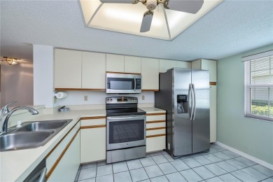 PANORAMIC GOLF VIEWS, this rarely available lovely 1st FLOOR- on Deep Creek Golf Club in Florida - for sale on GolfHomes.com, golf home, golf lot