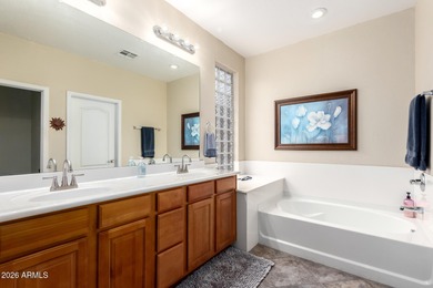 Beautiful gated home with a stunning backyard offering panoramic on Palm Valley Golf Club  in Arizona - for sale on GolfHomes.com, golf home, golf lot