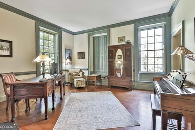 ONE OF GRIFFIN'S FINEST HOMES IS THIS BEAUTIFUL WILLIAMSBURG on The Club at Shoal Creek Golf Course in Georgia - for sale on GolfHomes.com, golf home, golf lot