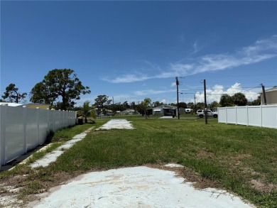 NEW PRICE on this SALTWATER CANAL-FRONT LOT with SEAWALL on Oyster Creek Golf Club in Florida - for sale on GolfHomes.com, golf home, golf lot