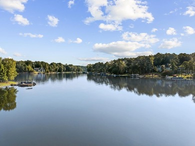 MODERN CALIFORNIA-INSPIRED LAKEFRONT RETREAT WITH POOL | Built on Harbor Club Golf and Country Club in Georgia - for sale on GolfHomes.com, golf home, golf lot