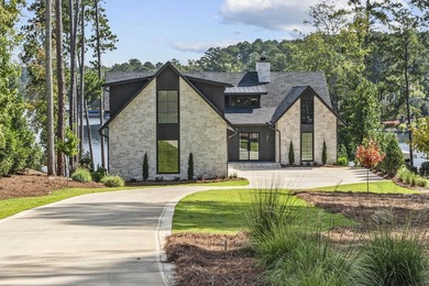 MODERN CALIFORNIA-INSPIRED LAKEFRONT RETREAT WITH POOL | Built on Harbor Club Golf and Country Club in Georgia - for sale on GolfHomes.com, golf home, golf lot