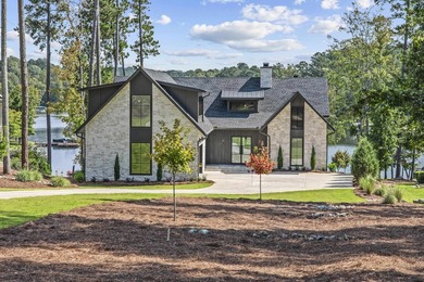 MODERN CALIFORNIA-INSPIRED LAKEFRONT RETREAT WITH POOL | Built on Harbor Club Golf and Country Club in Georgia - for sale on GolfHomes.com, golf home, golf lot