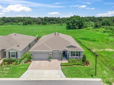 Experience luxury, flexibility, and privacy in this stunning and on Trilogy at Ocala Preserve in Florida - for sale on GolfHomes.com, golf home, golf lot