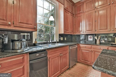 ONE OF GRIFFIN'S FINEST HOMES IS THIS BEAUTIFUL WILLIAMSBURG on The Club at Shoal Creek Golf Course in Georgia - for sale on GolfHomes.com, golf home, golf lot