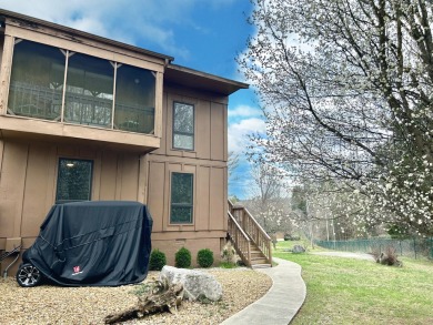 Discover lakeside living in this beautiful lower level condo for on Woodson Bend Resort in Kentucky - for sale on GolfHomes.com, golf home, golf lot