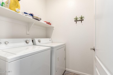 Beautiful gated home with a stunning backyard offering panoramic on Palm Valley Golf Club  in Arizona - for sale on GolfHomes.com, golf home, golf lot