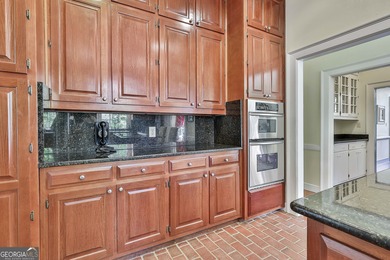 ONE OF GRIFFIN'S FINEST HOMES IS THIS BEAUTIFUL WILLIAMSBURG on The Club at Shoal Creek Golf Course in Georgia - for sale on GolfHomes.com, golf home, golf lot