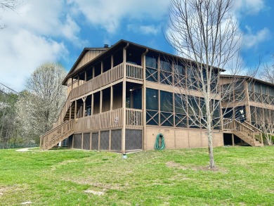 Discover lakeside living in this beautiful lower level condo for on Woodson Bend Resort in Kentucky - for sale on GolfHomes.com, golf home, golf lot