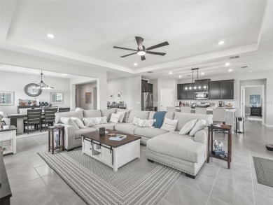 Experience luxury, flexibility, and privacy in this stunning and on Trilogy at Ocala Preserve in Florida - for sale on GolfHomes.com, golf home, golf lot