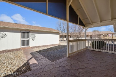 Designed for both comfort and style, this home is truly a gem on Quail Wood Greens Golf Course in Arizona - for sale on GolfHomes.com, golf home, golf lot